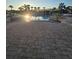 Stunning pool area with lush landscaping and ample seating for residents at 8923 Cuban Palm Rd, Kissimmee, FL 34747