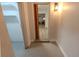 Hallway features new flooring and convenient access to additional rooms with recessed lighting at 1400 E Fern Rd, Lakeland, FL 33801