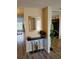 Inviting entryway featuring stylish console table and bright natural light at 7607 Benji Ridge Trl, Kissimmee, FL 34747