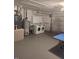 Spacious garage with a washer, dryer and ample storage at 7607 Benji Ridge Trl, Kissimmee, FL 34747