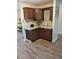 Kitchen featuring granite countertops, tile backsplash, and ample cabinet space at 7607 Benji Ridge Trl, Kissimmee, FL 34747