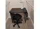 Functional office nook with desk, chair, and shelving, perfect for work at 7607 Benji Ridge Trl, Kissimmee, FL 34747