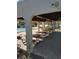 Poolside picnic area provides a shaded space for outdoor gatherings and relaxation at 7607 Benji Ridge Trl, Kissimmee, FL 34747