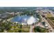 Scenic aerial shot of lakefront community, featuring lush green spaces and views of the surrounding cityscape at 1048 W Lime St, Lakeland, FL 33815