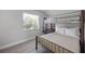 Comfortable bedroom with a bunk bed and soothing view outside the window at 1048 W Lime St, Lakeland, FL 33815
