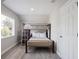 Practical bedroom featuring a bunk bed ideal for , bright walls and natural light at 1048 W Lime St, Lakeland, FL 33815