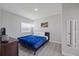 Cozy bedroom featuring a comfortable bed and a serene atmosphere at 1048 W Lime St, Lakeland, FL 33815