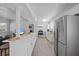 Spacious kitchen with stainless steel appliances in an open living area at 1048 W Lime St, Lakeland, FL 33815