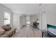 Open concept living room with ample space and a view to the office at 1048 W Lime St, Lakeland, FL 33815
