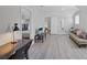 Spacious living room with modern finishes and view to the bedrooms at 1048 W Lime St, Lakeland, FL 33815