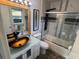 Bathroom featuring a modern vanity sink, stone floors, and glass-enclosed shower with modern fixtures at 4041 Se 20Th Ct, Ocala, FL 34480