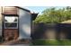 Beautiful exterior featuring a wooden accent wall, window box, and privacy fence at 4041 Se 20Th Ct, Ocala, FL 34480