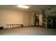 Spacious garage with painted floor, new appliances, and ample storage space at 4041 Se 20Th Ct, Ocala, FL 34480