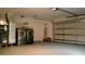 Clean garage with new washer, dryer, and furnace, offering plenty of storage and convenience at 4041 Se 20Th Ct, Ocala, FL 34480