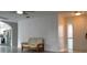 Bright living area featuring a geometric accent wall and modern entryway access at 4041 Se 20Th Ct, Ocala, FL 34480