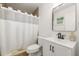 Bathroom featuring a shower with curtain and modern vanity at 5324 Messina, Lakeland, FL 33813
