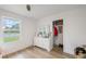 Bedroom with closet, large window, and light-colored walls at 5324 Messina, Lakeland, FL 33813