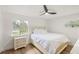 Bedroom with white walls, a ceiling fan and a window offering natural light at 5324 Messina, Lakeland, FL 33813