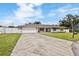 Well-maintained single-story home featuring a spacious driveway and inviting curb appeal at 5324 Messina, Lakeland, FL 33813