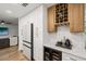 Kitchen featuring custom cabinets, built in wine storage, and luxury appliances at 5324 Messina, Lakeland, FL 33813