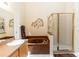 Elegant bathroom featuring a soaking tub, separate shower, and modern fixtures at 643 Blenheim Loop, Winter Springs, FL 32708