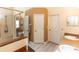 Bathroom featuring a glass door shower, white cabinets, and modern finishes at 643 Blenheim Loop, Winter Springs, FL 32708