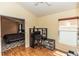 Bright bedroom with a desk area and view into connecting room at 643 Blenheim Loop, Winter Springs, FL 32708