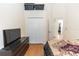 Bedroom featuring wood floors, television and bi-fold closet doors at 643 Blenheim Loop, Winter Springs, FL 32708