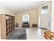 Bright foyer with high ceilings, arched window, and neutral tile flooring at 643 Blenheim Loop, Winter Springs, FL 32708