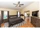 Comfortable bedroom with ceiling fan, carpeting, and neutral walls at 643 Blenheim Loop, Winter Springs, FL 32708