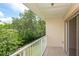 Balcony view overlooking lush greenery at 946 15Th St # 202, Daytona Beach, FL 32117