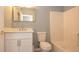 Bright bathroom featuring a vanity with a white cabinet and countertop, a toilet, and a shower-tub combination at 946 15Th St # 202, Daytona Beach, FL 32117