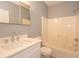 Bathroom boasting a quartz vanity, a modern faucet, and a shower-tub at 946 15Th St # 202, Daytona Beach, FL 32117