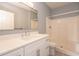 Bright bathroom with quartz countertop, modern fixtures, and updated shower at 946 15Th St # 202, Daytona Beach, FL 32117
