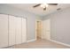 Bedroom with light gray walls and closet at 946 15Th St # 202, Daytona Beach, FL 32117