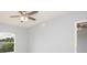 Spacious bedroom with ceiling fan and view from window at 946 15Th St # 202, Daytona Beach, FL 32117