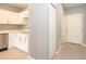 Kitchen featuring white cabinetry and stainless steel dishwasher at 946 15Th St # 202, Daytona Beach, FL 32117