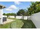 Fenced backyard offering privacy and a safe space for play and relaxation at 303 Briarbrook Ln, Haines City, FL 33844