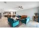 Open-concept living room with views of the kitchen, perfect for Gathering gatherings at 303 Briarbrook Ln, Haines City, FL 33844