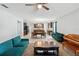 Spacious open-concept living area connected to a kitchen and dining space at 303 Briarbrook Ln, Haines City, FL 33844