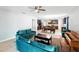 Bright, open living room showcasing tile floors and ample furniture arrangement possibilities at 303 Briarbrook Ln, Haines City, FL 33844