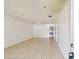 Bright, open living room with tile flooring and neutral walls at 5455 Pinetrail Way, Orlando, FL 32822