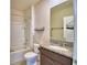 Bathroom featuring granite vanity and shower/tub combination at 2005 Carnostie Rd, Winter Haven, FL 33884