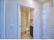 Bathroom with granite countertops, storage, tile flooring and shower/tub combination at 2005 Carnostie Rd, Winter Haven, FL 33884
