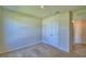 Bedroom with carpet flooring, and closet at 2005 Carnostie Rd, Winter Haven, FL 33884