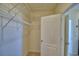 Bright walk-in closet with metal shelving, providing ample storage space at 2005 Carnostie Rd, Winter Haven, FL 33884
