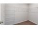 Spacious walk-in closet with installed shelving for optimal storage at 3730 King Hill Dr, Haines City, FL 33844