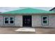 New single-story home construction with a green roof and block construction at 5728 Haystack Drive, St Cloud, FL 34771