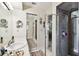 Bright bathroom with tiled shower and framed mirror at 6642 Parson Brown Dr, Orlando, FL 32819