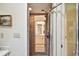 Neutral colored bathroom with tiled shower and glass door at 6642 Parson Brown Dr, Orlando, FL 32819